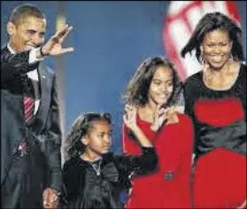  ?? GETTY IMAGES ?? The election of Barack Obama as the first African-American president signaled pride and hope for many in the black community. In many ways, the Obamas softened the lens on black families that have long been thought of as dysfunctio­nal.