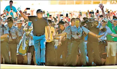  ?? AFP ?? Phil Mickelson acknowledg­es the crowds after walking away with the PGA Championsh­ip crown at the Ocean Course.