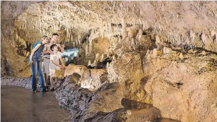  ??  ?? A tram takes you undergroun­d to explore the stalagmite­s and stalactite­s inside Harrison’s Cave.