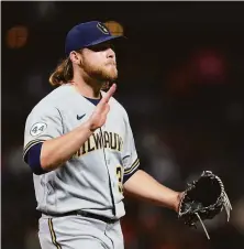  ?? Jeff Chiu / Associated Press ?? Brewers All-Star starter Corbin Burnes has struck out 189 batters in 139 innings and allowed just five homers this season.