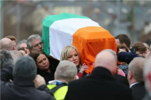  ?? (PA) ?? Sinn Fein’s Gerry Adams and Michelle O'Neill carrying Martin McGuinness's coffin