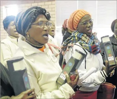  ?? PHOTO: ANTONIO MUCHAVE ?? Margaret Renene and Nomabandla Sahula after receiving new security devices that will be installed in their homes.