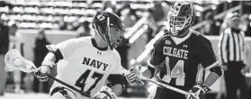  ?? PAUL W. GILLESPIE/BALTIMORE SUN ?? This game against Colgate on March 7 was Navy’s final one in the 2020 lacrosse season.