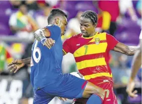  ??  ?? Panama’s Roderick Miller (left) and Grenada’s Oliver Norburn fight for the ball during the Concacaf Gold Cup Group D football match at Exploria Stadium in Orlando, Florida, on July 20, 2021.