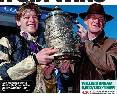  ?? INPHO ?? Gold standard: David Mullins (left) and Willie Mullins with the Gold Cup