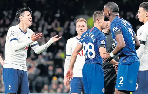  ?? AFP ?? Tottenham’s Son Heung-Min, left, talks to Chelsea’s Antonio Rudiger, No.2, after their clash that led to the former being sent off.