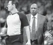  ??  ?? CLIPPERS COACH Doc Rivers tries to make a case to referee Mark Ayotte in the first half.