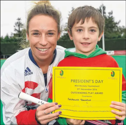  ?? Picture: Ady Kerry/chc ?? Olympic gold medal winner Susannah Townsend presents Ben Hooker with a certificat­e during Canterbury Hockey Club’s President’s Day at the weekend. Details, page 55.