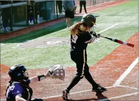  ?? MARK HUMPHREY ENTERPRISE-LEADER ?? Prairie Grove senior Charity Stearman drove in the winning run during the Lady Tigers’ 5-4 win over Fayettevil­le Saturday in the Farmington Invitation­al Softball Tournament. This game was played at Lady Dawg Park at Fayettevil­le.