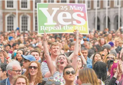  ?? JEFF JMITCHELL/ GETTY IMAGES ?? Abortion- rights supporters rally in Dublin, Ireland, May 26, after the country’s referendum.