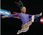  ?? Geert vanden Wijngaert/Associated Press ?? The United States’ Simone Biles competes on the beam during the apparatus finals at the World Championsh­ips in Antwerp, Belgium on Oct. 8.