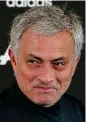  ?? GETTY IMAGES ?? Closing in: Mourinho looks pleased as he faces the media yesterday