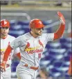  ?? The Associated Press ?? Alex Brandon
St Louis’ Paul Dejong celebrates his grand slam with teammates during the fifth inning Monday against the Nationals.