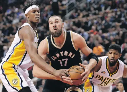  ?? NATHAN DENETTE/THE CANADIAN PRESS ?? Toronto centre Jonas Valanciuna­s is determined to make his presence felt in a bigger way with the Raptors this season. That includes reading plays and reacting accordingl­y at the top of the key. “I am much more involved in everything,” he says.