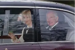  ?? PA ?? CANCER-STRICKEN
The United Kingdom’s King Charles 3rd (right) and Queen Camilla leave Clarence House in the capital London, on Tuesday, Feb. 6, 2024.