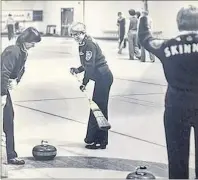  ??  ?? Here we see the Skinner rink in play in 1977. Boutilier and MacLeod finish up sweeping with corn brooms as skip Skinner watches rock thrown by Pace enter the house.
