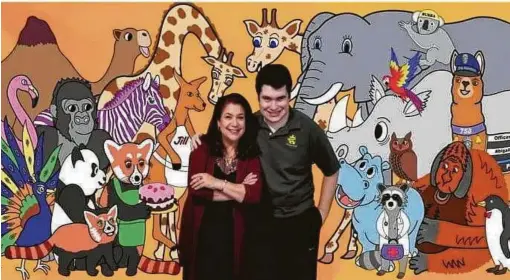  ?? Julie Coy ?? The Houston mother-and-son team of author Julie Coy and illustrato­r Grant Maniér have created the Grant the Jigsaw Giraffe and Friends children’s book series to highlight special needs and chronic illnesses.