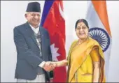  ?? PTI ?? External affairs minister Sushma Swaraj with her Nepali counterpar­t Pradeep Kumar Gyawali in New Delhi on Thursday. Both agreed to convene the 5th meet of the Joint Commission at foreign minister level in Kathmandu at the earliest.