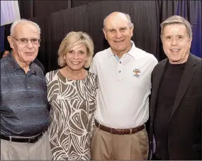  ??  ?? Coach Clyde Horton, Judy and Jim Irwin and Bud Whetstone