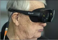  ?? (AP/Lynne Sladky) ?? Retired Army Col. Farrell Patrick, 91, wears a Mynd Immersive virtual reality headset at John Knox Village in Pompano Beach, Fla. John Knox Village was one of 17 senior communitie­s around the country that participat­ed in a recently published Stanford University study that found that large majorities of 245 participan­ts between 65 and 103 years old enjoyed virtual reality, improving both their emotions and their interactio­ns with staff.