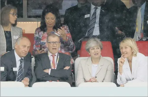  ?? PICTURE: ADAM DAVY/PA. ?? LORDS GUEST: Theresa May and her husband Philip, second from left, watch the Test match with England Cricket Board chairman Colin Graves.