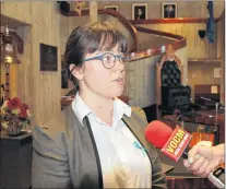  ?? ASHLEY FITZPATRIC­K/THE TELEGRAM ?? Coun. Maggie Burton speaks with reporters following the St. John’s city council meeting on Monday night.