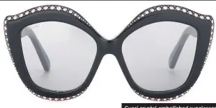  ??  ?? Gucci crystal-embellishe­d sunglasses £425, MyTheresa, mytheresa.com