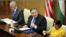  ?? MANISH SWARUP — THE ASSOCIATED PRESS ?? From left, U.S. Defense Secretary James Mattis, U.S. Secretary of State Mike Pompeo, and Indian Foreign Minister Sushma Swaraj get ready to make a joint statement after so called “2+2” talk in New Delhi, India, Thursday. Pompeo and Mattis held long-delayed talks Thursday with top Indian officials, looking to shore up the alliance with one of Washington’s top regional partners.