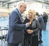  ?? PHOTOS: PATRICK BROWNE ?? Wipeout: Verona Murphy and Justice Minister Charlie Flanagan at the count centre, in Wexford Town.