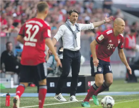  ?? Getty ?? Niko Kovac, 42, is coaxing the best out of his players, some of them closer to his generation such as Arjen Robben, 35, right