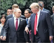  ?? REUTERS ?? Putin y Trump conversan durante la cumbre de la APEC.