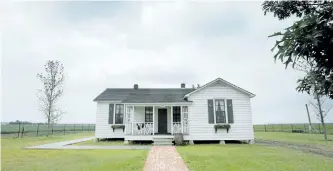  ?? THE ASSOCIATED PRESS FILES ?? Rain clouds gather over the childhood home, dating to the mid 1930s, of singer Johnny Cash, in Dyess, Arkin 2014.
The country music icon Cash’s boyhood home is being considered as a nominee for inclusion on the National Register of Historic Places....