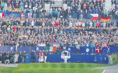  ?? Picture: Reuters ?? THEY’RE OFF! Team USA’s Tony Finau hits the first ball off the tee at the Ryder Cup yesterday.