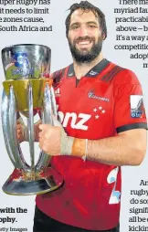  ?? Photo / Getty Images ?? Sam Whitelock with the Super Rugby trophy.