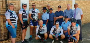  ??  ?? With the cycling group are, from left: Capt Nolonwabo Tshengu, Const Rachel Hendricks, LtCol Elmarie van der Westhuysen, CPF chairman Charles Newham, Kretzensho­op Primary’s headmaster Dalcon Arries and Capt Antoinette Stoop.