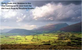  ??  ?? Dark clouds over Skiddaw in this view looking north-west from the Old Coach Road by Threlkeld Knotts.