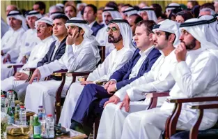  ?? Wam ?? Sheikh Mohammed bin Rashid attends a session of the meeting of the World Economic Forum’s Global Future Councils, which commenced in Dubai on Sunday. Also seen are Sheikh Hamdan bin Mohammed, Sheikh Maktoum bin Mohammed, Sheikh Ahmed bin Mohammed, and other officials. —