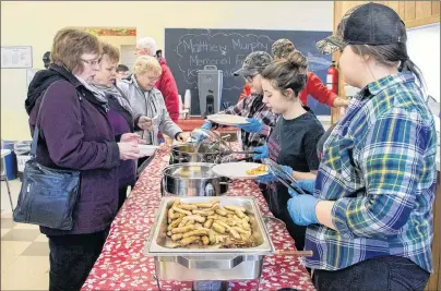  ?? SUBMITTED PHOTO BY JOLENE MURPHY/WWW.INSTAGRAM.COM/DASWELL ?? Attendees line up during the fourth annual Matthew Murphy Memorial Fishermen’s Breakfast at Bonshaw Community Centre on Sunday. The breakfast has helped raise thousands of dollars for mental health and anti-bullying initiative­s since its beginning...