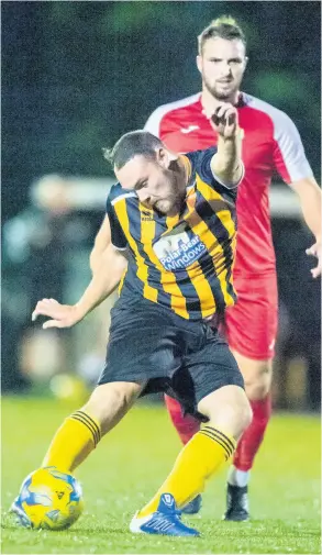  ?? PICTURE: Paul Gillis ?? Keynsham Town (yellow and black) in action against Cadbury Heath in September