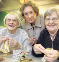  ??  ?? ●●Jane England, Josie Storey (embroidere­r from Wetherby) and Joyce Sankey made Christmas decoration­s with a difference