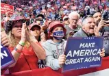  ?? NICHOLAS KAMM/AFP VIA GETTY IMAGES ?? Supporters cheer during President Donald Trump’s first campaign rally in over three months at the BOK Center on Saturday in Tulsa, Oklahoma.