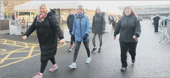  ??  ?? STRIDING OFF The Home-Start Portsmouth team left Waitrose in Marmion Road, Southsea, on Tuesday for the 15-mile walk fundraisin­g walk around Portsea