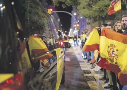  ?? Foto: dpa ?? Demonstran­ten protestier­en in Barcelona gegen die Amnestie.