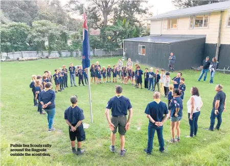  ??  ?? Paihia Sea Scouts rally around the flagpole outside the scout den.