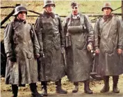  ?? ?? Left: A group of NSKK-trained Army motorcycle dispatch riders, their fulllength leather coats can be buttoned round their legs while driving