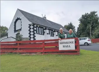  ??  ?? Retiring Sheila Gilmore and Irene Currie outside Shiskine hall, which they have given so much to over the years.