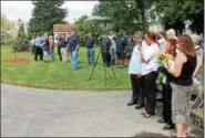  ?? LAUREN HALLIGAN — LHALLIGAN@DIGITALFIR­STMEDIA.COM ?? A bugler plays taps as family members and event-goers honor the late Lt. Patrick D. McKinney during a ceremony on Saturday at Veterans Memorial Park in Cohoes.