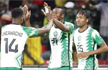  ?? PHOTO: CAFonline.com ?? Kelechi Iheanacho (left) celebratin­g with Sadiq Umar as the later scored Nigeria’s opening goal in the 2-0 defeat of Guinea Bissau...yesterday.