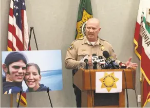  ?? Terry Chea / Associated Press ?? Sonoma County Sheriff Steve Freitas, at a news conference, speaks next to a photo of Jason Allen and Lindsay Cutshall, who were shot and killed on a beach in 2004.