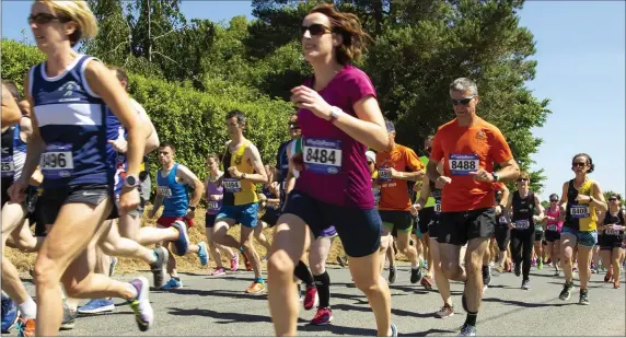  ??  ?? Action from the StJoseph’s Athletic Club’s annual Pink Rock 10km walk and run.